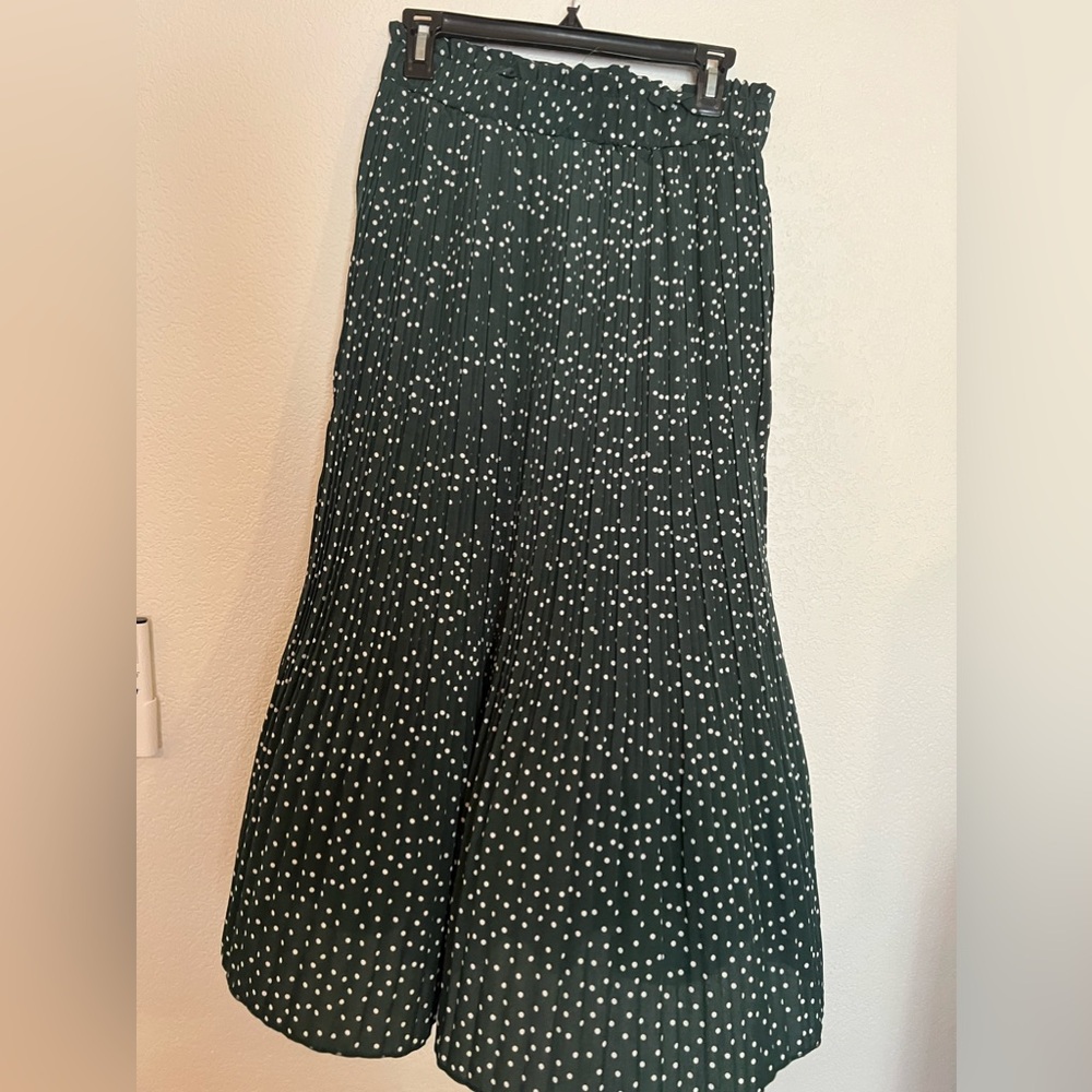 Green pleated skirt